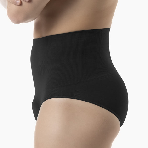 Black shapewear being worn on a white background