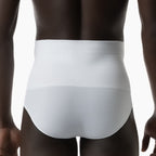 White underwear worn by a person on a white background