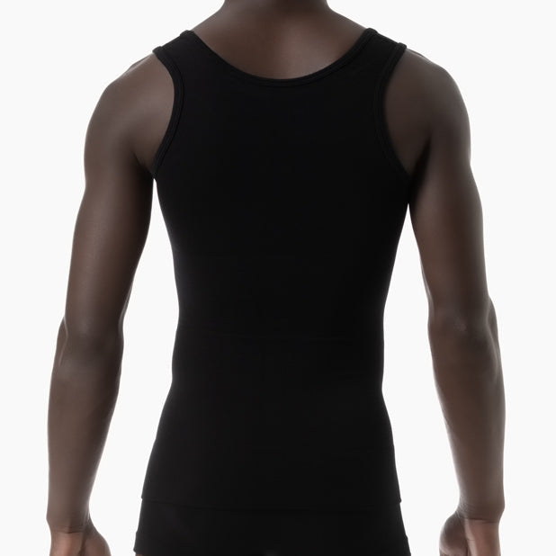 Black tank top worn by a person on a white background