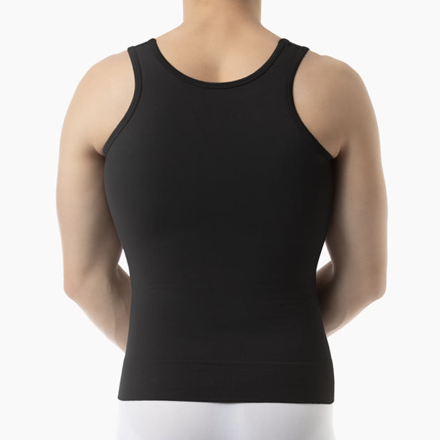 Black tank top worn by a person on a white background