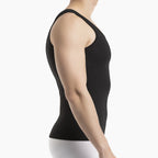 Black tank top worn by a person on a white background