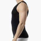 Person wearing a black tank top on a white background