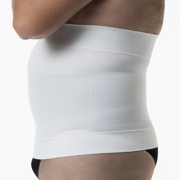 White compression garment worn by a person on a white background