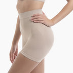Beige shapewear worn by a person on a white background