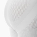 Close-up of a textured white sock on a light gray background