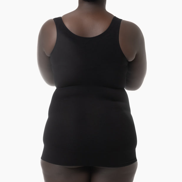 Black tank top worn by a person on a white background