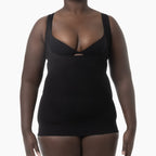 Black shapewear garment worn by a model on a white background