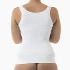 White tank top worn by a person on a white background