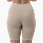 Beige shapewear shorts on a white background