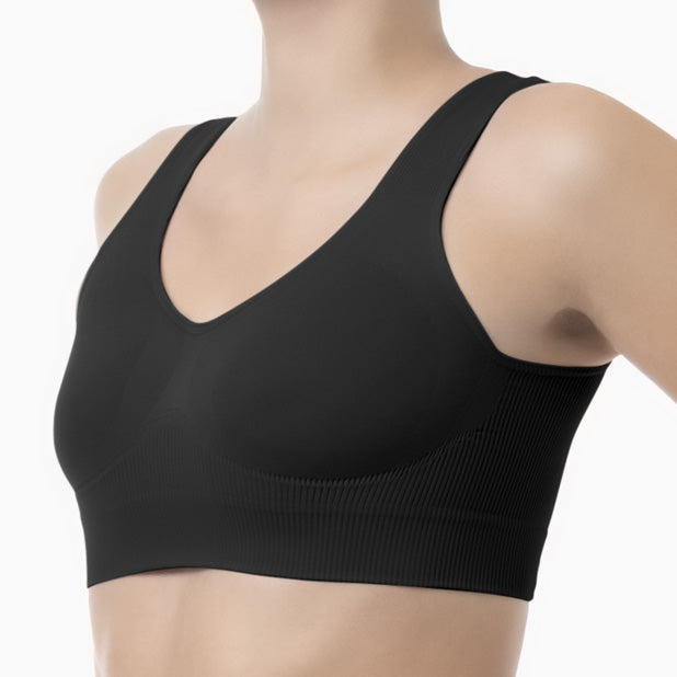 Black sports bra on a mannequin against a white background