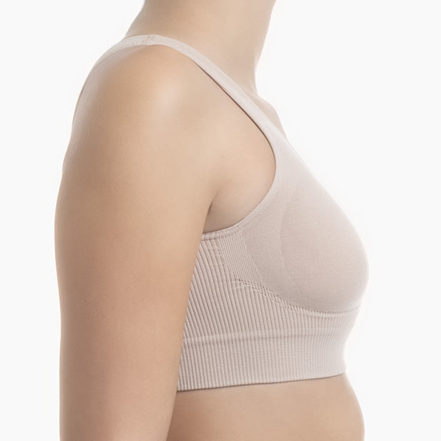 Beige bra on a white background