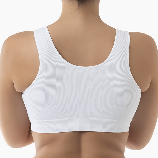 White sports bra on a plain background