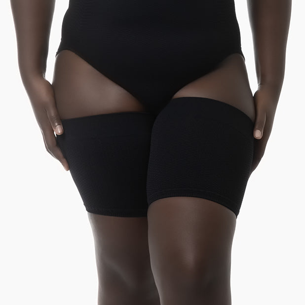 Black high-waisted underwear on a white background