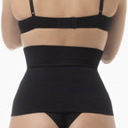 Black shapewear garment on a white background