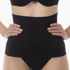 Black waist trainer worn by a person on a white background