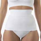 White shapewear garment worn by a person on a white background